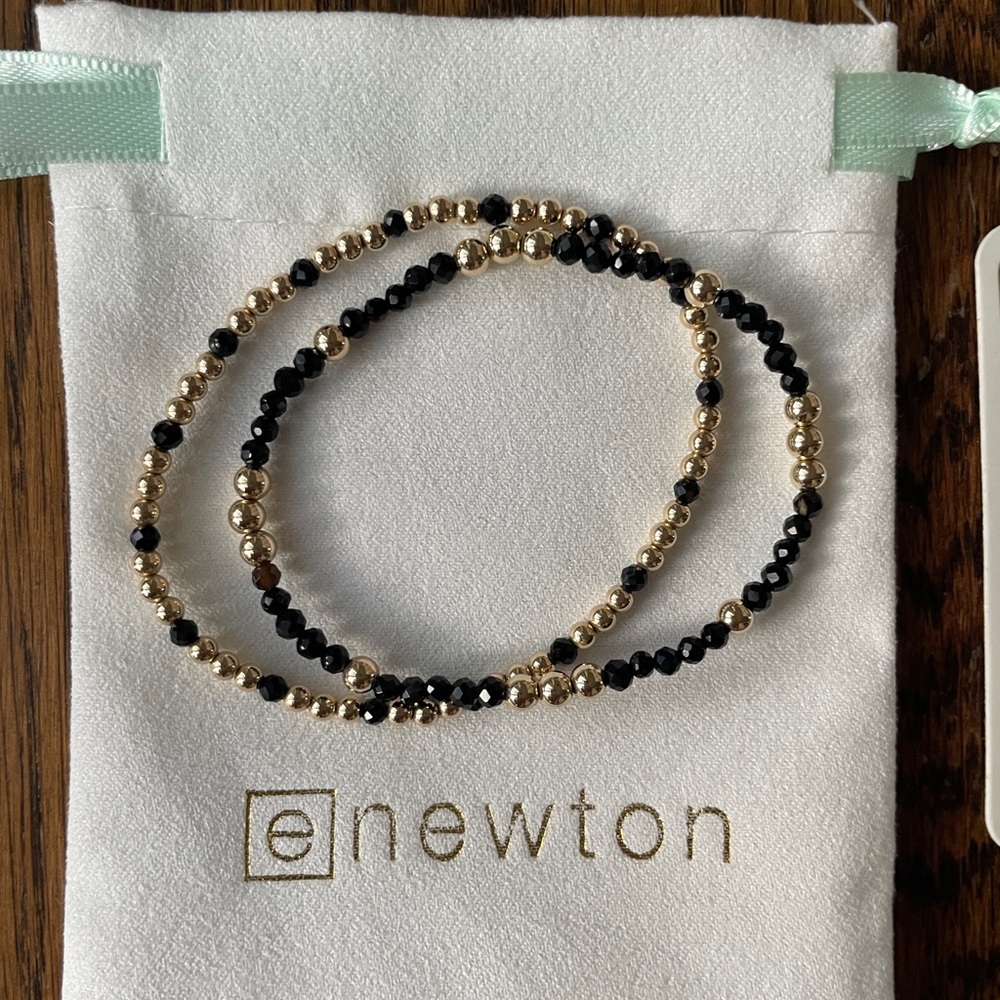 ENewton black & gold bracelets!  Excellent condition barely worn! Beautiful!